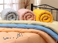 Какое одеяло лучше выбрать: основные характеристики материалов
